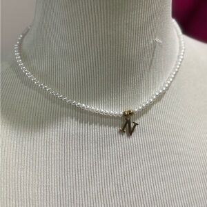 Elegant Pearl Necklace with Gold Accent